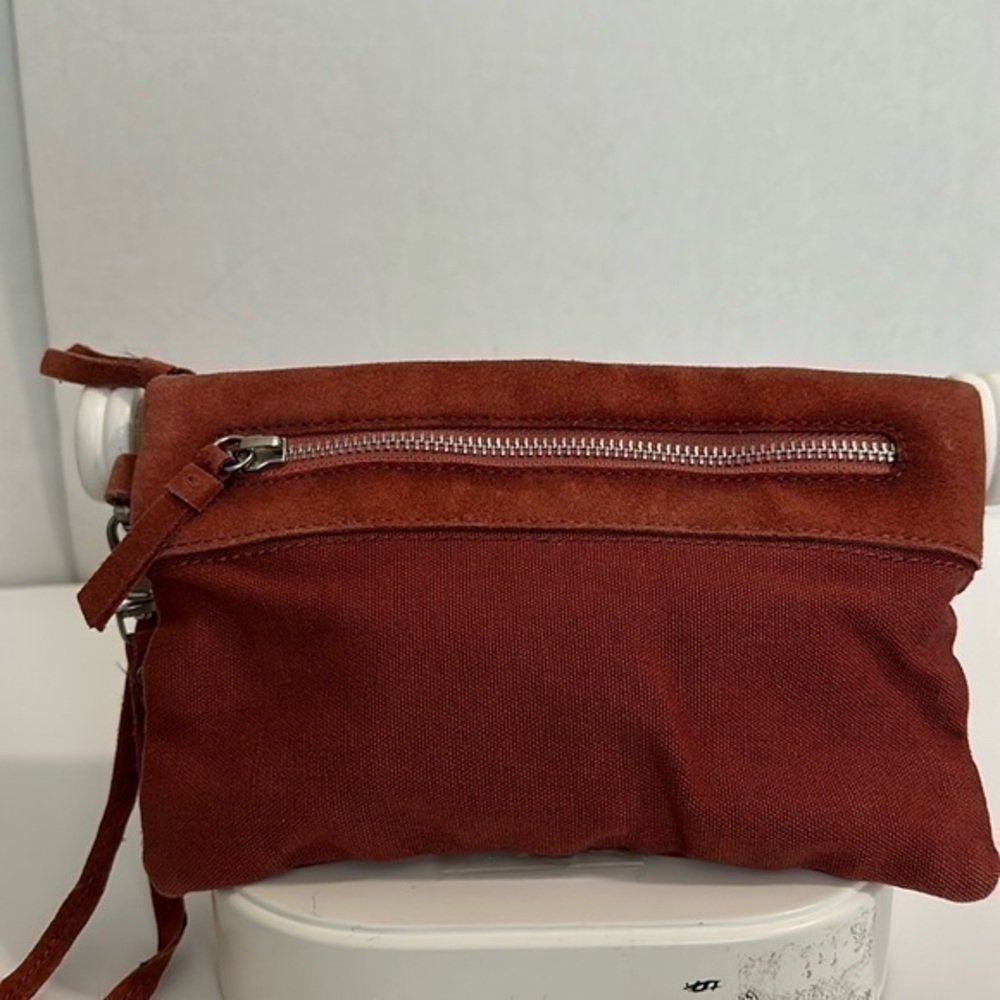 BDG from URBAN OUTFITTERS Rusty orange suede like clutch/wristlet